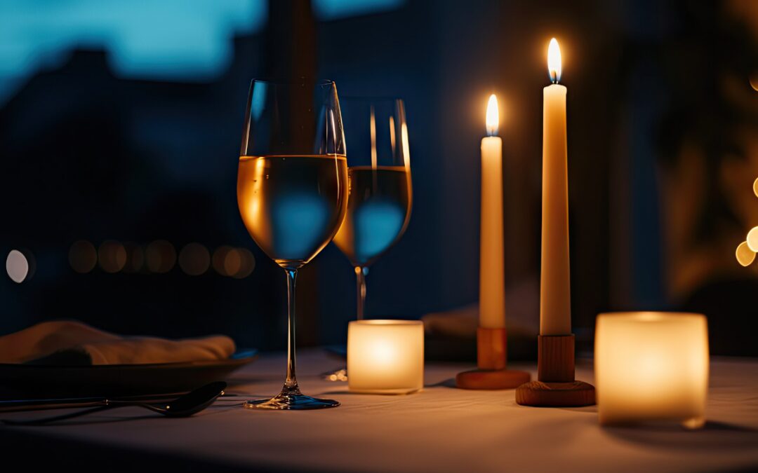 Candlelit dinner table with wine glasses creating a cozy, intimate atmosphere for a winter dining experience in Bryan, Texas